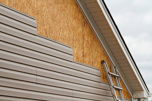 Professional Storm Damage Siding Repair technician working in Friendsville, MD